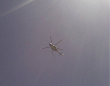 Helicopter flys over Ngaba kirti Monastery on March 22, 2008